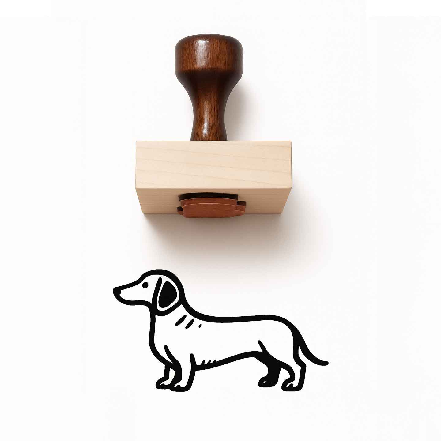 Rubber stamp with a dachshund design on a white background